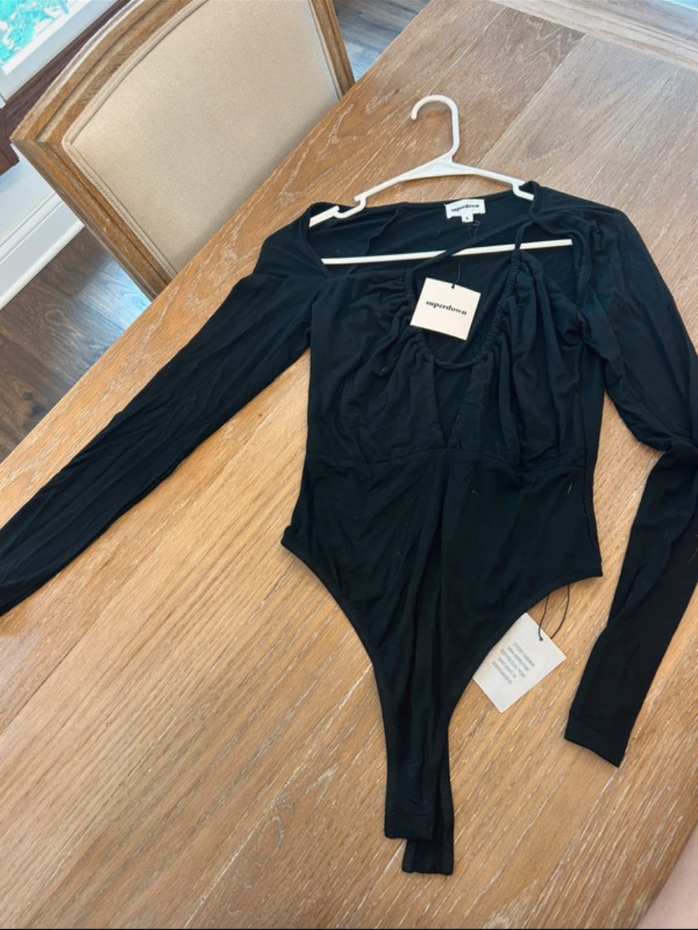 Super down Black Long Sleeve cut out bodysuit